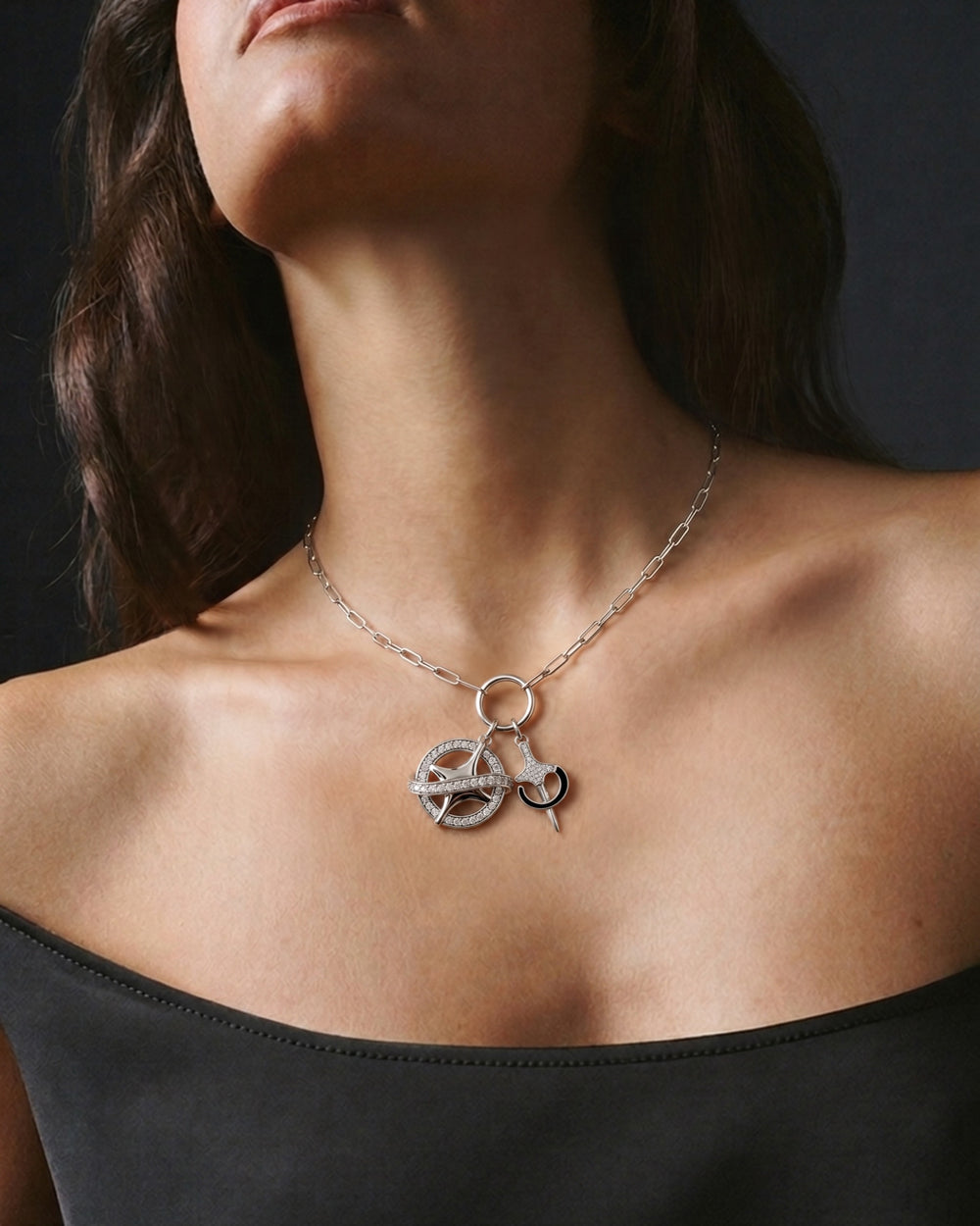 Orion Mizar Charm in 925 sterling silver, shown worn